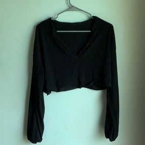 Black long sleeved crop top with v neck